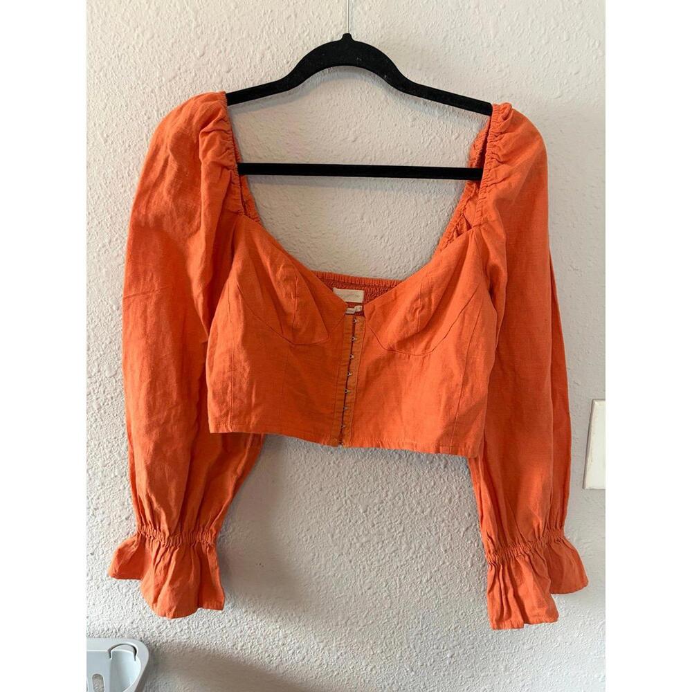 Urban Outfitters orange cropped long sleeve size L. Clasp front